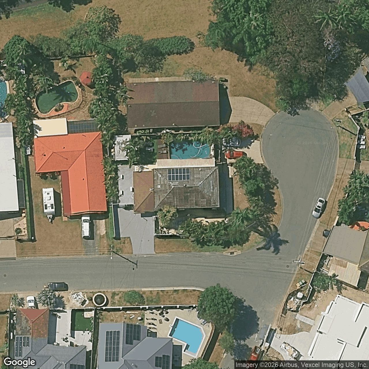 Aerial view of 12 Sacha Place, Carrara QLD 4211