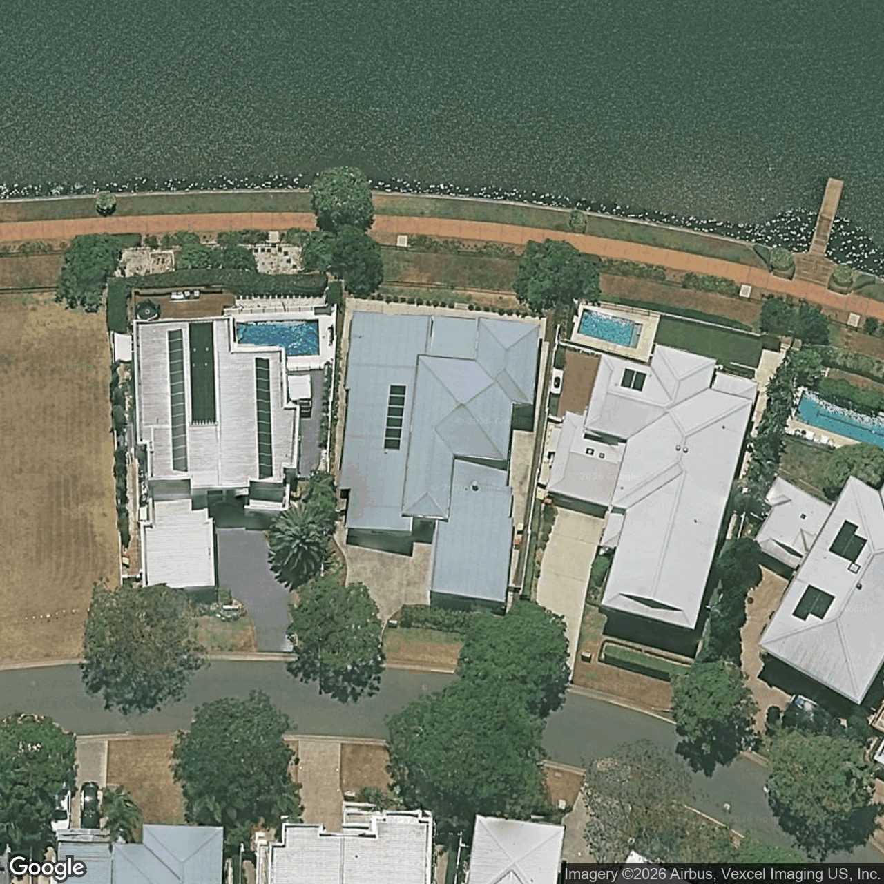 Aerial view of 5049 Emerald Island Drive, Carrara QLD 4211