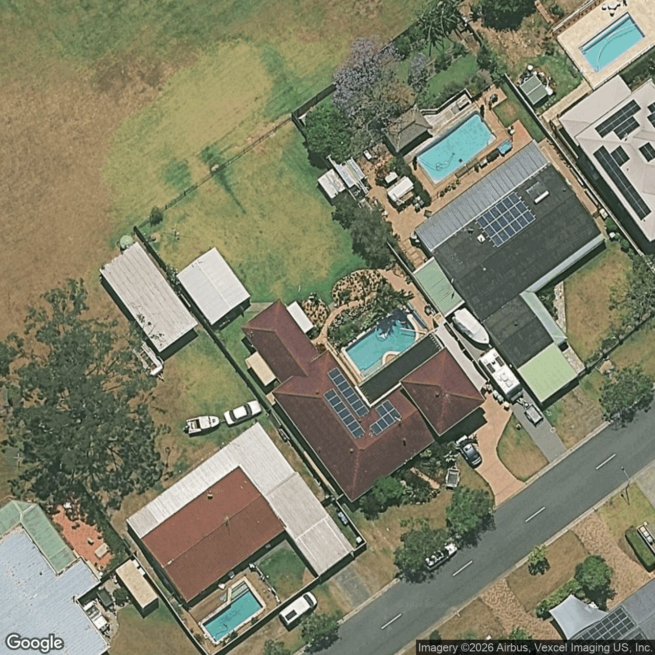 Aerial view of 15 Madigan Road, Carrara QLD 4211