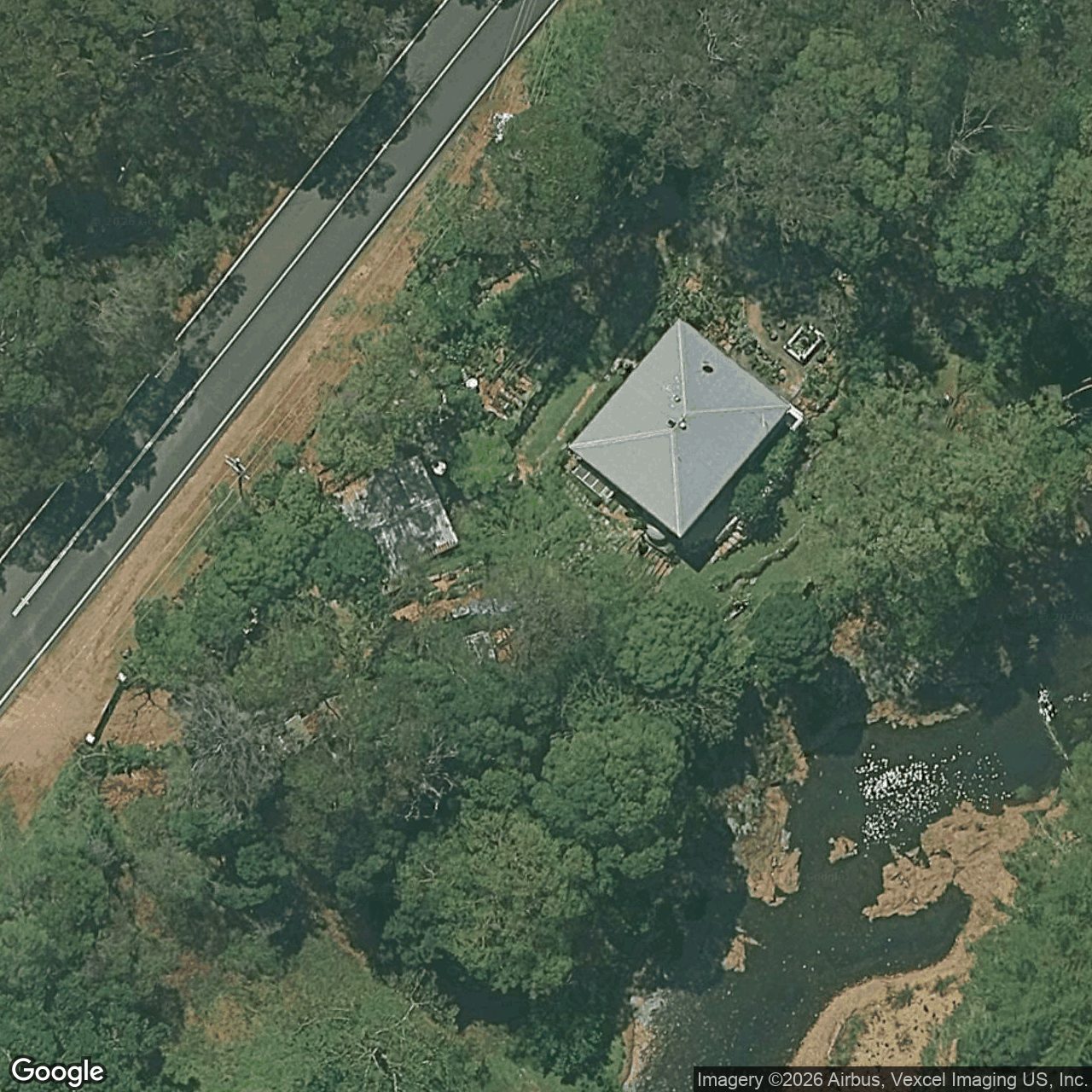 Aerial view of 519 Tallebudgera Creek Road, Tallebudgera Valley QLD 4228